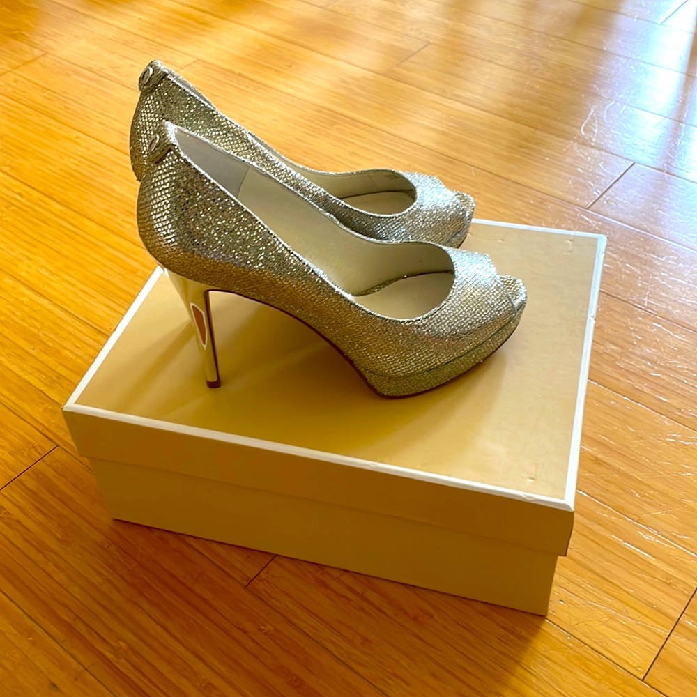 Brand new Michael Kors stilettos.